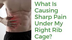 Pain under the rib cage on the left side can be caused by a pulled muscle or irritable bowel syndrome. What Is Causing Sharp Pain Under My Right Rib Cage Youtube