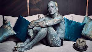 As previously noted, everton forward theo walcott has many tattoos, including a mysterious lady wrapped in goblins on his left arm. I M No Different To Anyone Else Meet Lucky Diamond Rich The World S Most Tattooed Man Guinness World Records