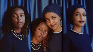 Her wrist is wrapped in a green scrunchie that matches her striped. Representative Ilhan Omar And Isra Hirsi On The Future Of Politics And 2020 Teen Vogue