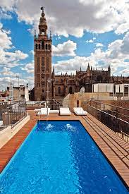 Busca hoteles en sevilla con piscina cubierta. Un Bano De Vertigo Las Mejores Terrazas De Hotel Con Piscina De Espana