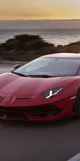 Sports Car On Road Lamborghini Aventador Svj 1080x2160 Wallpaper Sports Car Lamborghini Aventador Lamborghini