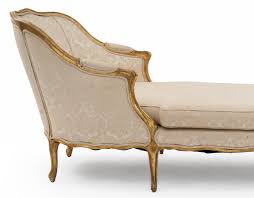 Cupid bed in black american walnut & velvet with integrated bedside table by casa botelho. American Art Deco Wheeled Wicker Chaise