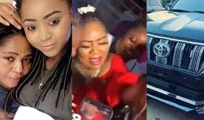 REGINA DANIEL BUYS PRADO JEEP FOR MOTHER Nollywood actress, Regina Daniels,  has gifted her mother, Rita Daniels, a Prado Jeep reportedly worth N15  million