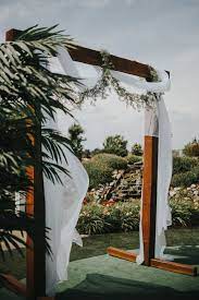 Outdoor Wedding Ceremony Wooden Wedding Arbor White Fabric Natural Wedding Decor See The Ful Outdoor Wedding Ceremony Wedding Archway Natural Wedding Decor