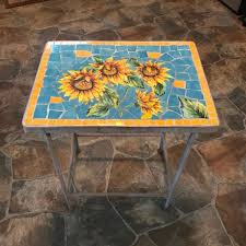 Keep broken china pieces, breaking china that you have chosen for the table, or break tiles in colors you prefer to use for the table. Sunflower Mosaic Tile Patio Side Table Plant Stand