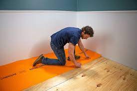 The right glue is very important here, it's what keeps your floor from squeaking. How To Lay Tile Diy Floor Tile Installation Lowe S