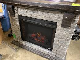 Fireplaces are becoming such a trend these days, that even faux fireplace mantel are becoming a trend in homes nowadays. Highland 50 In Faux Stone Mantel Electric Fireplace In Gray Scratched Dings Used Truckload Blowout Sale Huge Qty Lots Flooring Vanity Full Pallets For Resale And More Retail Quality