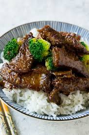 A Bowl Of Beef And Broccoli Stir Fry Over Rice Broccoli Beef Easy Beef And Broccoli Beef Broccoli Stir Fry