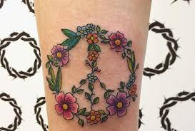 Peace tattoos for girls, men & women. Peace Sign Tattoo Design The History Original Meaning