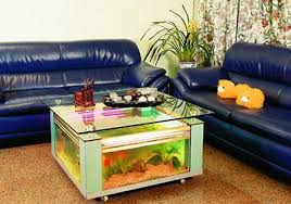 So instead of opting for your traditional wooden or metallic coffee table, go for a table filled with water that is surrounded by glass and experience the pleasure of enjoying marine life right from the. Most Elegant Coffee Tables And Creative And Space Saving Ideas For Home Decor With Built In Aquarium Hometone Home Automation And Smart Home Guide