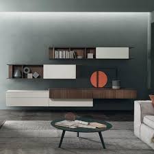 Die Exklusive Design Wohnwand C25 Bietet Eine Gelungene Mischung Von Einem Lowboard Und Wandregalen Mit Teils Offenen Element Designer Wohnwand Wohnen Wohnwand