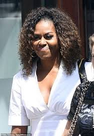 Michelle Obama Models Natural Curls And A White Dress For Nyc Luncheon Michelle Obama Hairstyles Hair Color For Black Hair Natural Hair Styles