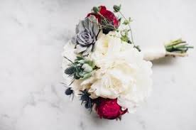 At the end of the night, guests enjoyed taking home small bouquets of the reception flowers put together by jenn. Thistle Wedding Bouquets