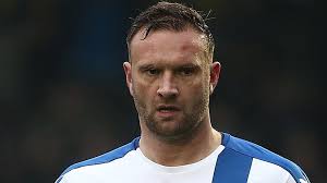 Ian Evatt: Chesterfield defender signs one-year contract extension