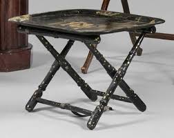 This sturdy square table sits on five metal casters, making it simple to move this table from room to. Lot Art Coffee Table With A Black And Gold Lacquered Sheet Metal