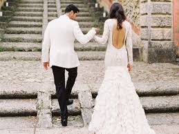 A whimsical kaftan inspired bell sleeve wedding gown. 39 Of Our Favorite Dresses From Real Weddings