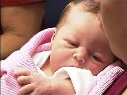 Overseas father meets baby via Internet