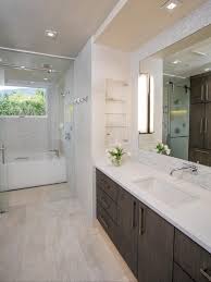 The Designer Of This Bathroom Was Tasked With Creating A Space With Plenty Of Light She Deli Bathroom Renovation Trends Bathroom Design Trends Shower Lighting