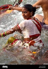 Woman Bathing In The Ganges River At The Third Shahi Snan Kumbh Mela In  46434 | Hot Sex Picture