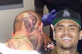 Check out chris browns neck tattoo meanings and pictures of breezy's neck tattoos w/ the story behind his and rihannas matching chris brown hand and wrist tattoos were some of his first ink. Chris Brown Shocks Fans As He Unveils A Massive Venus De Milo Tattoo On The Back Of His Head Mirror Online
