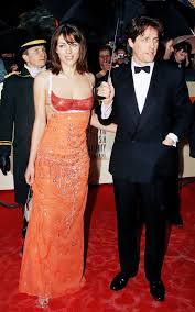 These days every actor in hollywood has a stylist and a fashion. Out Of Millions Of Bafta Images You Need To See These 15 Flashback Looks In 2021 Best Celebrity Dresses Hugh Grant Liz Hurley Bafta Red Carpet
