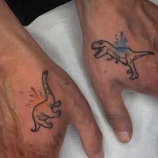 Although not very popular, a dinosaur tattoo design is a beautiful way to bring homage to these. Some Dinos For Andrew As His Son Is Really Into Them Nerdytattoos Darkartists Uktta Tattoo Ta T Rex Tattoo Dinosaur Tattoos Tattoo For Son