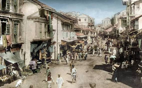 Early 20th Century. British India, Bombay (Mumbai). Street Scene in Bombay. Location? All theories are welcome. This is possibly Matunga - many thanks to Marlon Blackpool for this information. Also described on