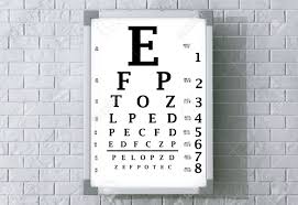 Snellen Eye Chart Test Box In Front Of Brick Wall 3d Rendering