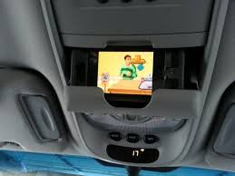 Daddy S Iphone As Dvd Player In Sunglass Holder In Mini Van Mini Van Minivan Organization Sunglass Holder
