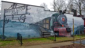 Featured in the iconic film, fried green tomatoes, the whistle stop cafe remains open and serves classic southern food in a cozy atmosphere. The Whistle Stop At The American Cafe In Travelers Rest