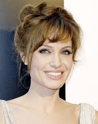 Crystal Cattle: Angelina Jolie will eat Carrie Underwood's steak any day.