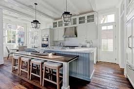 The spacious wood surface with a drop leaf is perfect for expanding your work area or as a ready breakfast bar. Kitchen Island With Drop Down Table Design Ideas