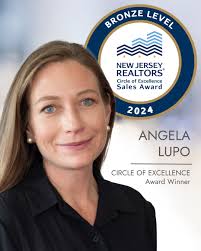 Turpin congratulates Gerry-Jo Cranmer. Mary Licata and Angela Lupo