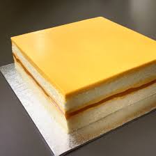 Soft Cotton Sponge Cake Layered With Mango Mousse Mango Jelly And Mango Chocolate Glaze Mango Jelly Mousse Dessert Mango Chocolate