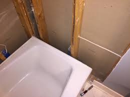 We got all ambitious and decided to tile the tub surround up to the ceiling. Retiling A Tub Surround Not Sure How To Shim It Home Improvement Stack Exchange