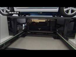 .ceo of better place, told the crowd that his battery swapping stations would cost $500,000 to there will be a little robot that slips under an electric car and replaces a pancake style battery that. Better Place Battery Swap Demonstration Youtube