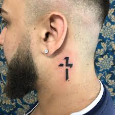 It resembles a lower case t. The 110 Best Christian Tattoos For Men Improb