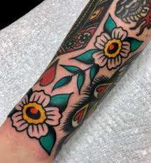 The cherry blossom design is the smallest tattoo design among all flower tattoo designs and these types of tattoos are popular among japanese style tattooing. American Traditional Flower Tattoos A Visual Guide