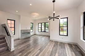 Engineered Flooring Black Windows Great Lighting And Quartz Fireplaces Give All The Heart Eyes Mulberry Is Custom Home Builders Custom Homes Home Builders