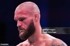 Esteban Ribovics of Argentina knocks out Thomas Paull of England in a...  News Photo