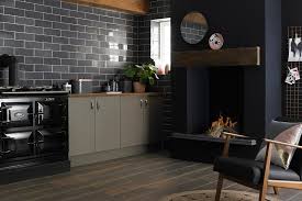 The polished wooden table adds a natural element in the space. Dark Kitchens Black Navy And Dark Grey Kitchen Ideas Loveproperty Com