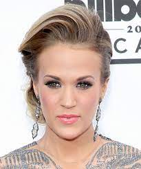 Her debut single, inside your heaven, made her the only country artist to debut at number one on the billboard hot 100 chart and the only solo country artist in the 2000s to have a. 33 Carrie Underwood Hairstyles Hair Cuts And Colors