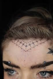 Image result for forehead tattoo