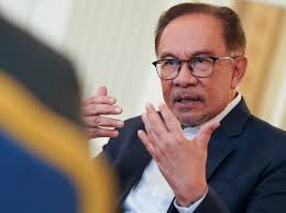 Malaysia KK Super Mart outlet attacked with Molotov cocktail as furore over  'Allah socks' spreads