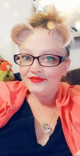 Can you identify this bright red lipstick brand?