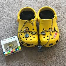 This surprising collaboration came about when post tweeted, u can tell a lot about a man by the jibbitz in his crocs. Post Malone Crocs With Jibbitz Yellow Crocs Crocs Hype Shoes