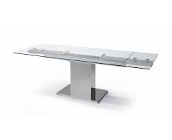 Stark extending dining table with glass, ceramic or laminate top mounted on a trestle base. Liv Extendable Modern Rectangular Dining Table