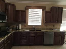 A nice thing about that method is it darkens the cabinets without over darkening the grain. Lighter Brighter Kitchen Cabinets How To Update Your Kitchen Cabinets