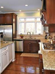 Beige Granite Countertops In Traditional Kitchen Cherry Cabinets Kitchen Kitchen Cabinetry Kitchen Design