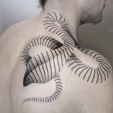 Aleksy Marcinow Snake Tattoo